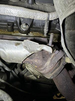 Broken or backed out bolt and oil leak