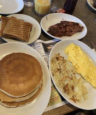 Breakfast Deluxe (2 eggs, meat, short stack, home fries or grits, and toast)