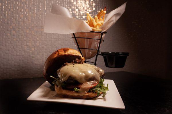 Classic Mpire Burger, wagyu burger with black truffle sauce, served with seasons arugula, sliced Romano Italian tomato, side of fries