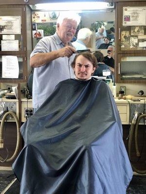 Grandson! The barber Loren is a legend! No BS. The place is old school 1970 era. Throwback in time.