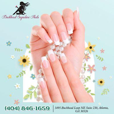 A french white manicure achieves a clean and pristine aesthetic, with crisp white tips against a natural or light pink base, offering a fr