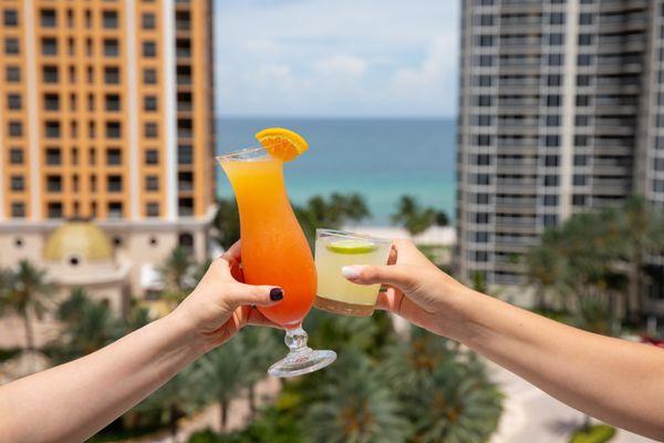 Refreshing poolside cocktails with stunning ocean views