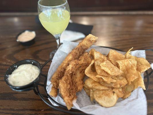 Fish basket with kettle chips and a mimosa