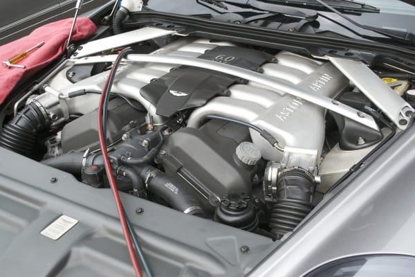 2006 Aston Martin DB9 6.0L V12. Charging the A/C system shortly after replacing all spark plugs and ignition coils.