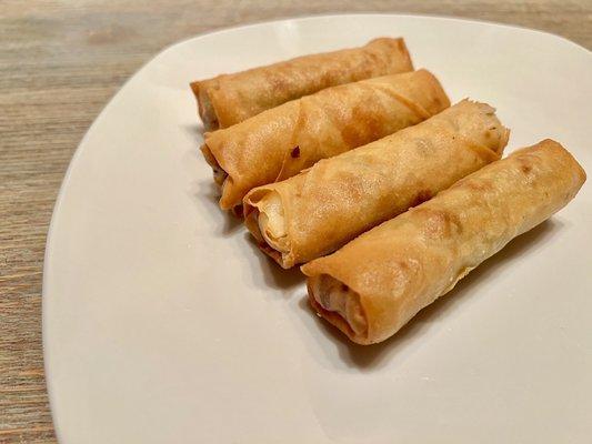 Egg Rolls. Golden crispy wrapper filled with vegetables. Nicely done. It comes with a sweet and sour sauce.