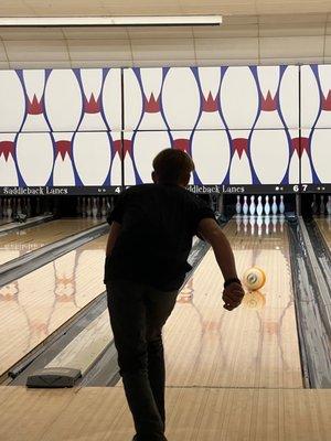 Grandson bowling a strike.