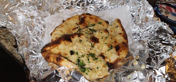 Garlic naan. Looks great but was dry and tasteless