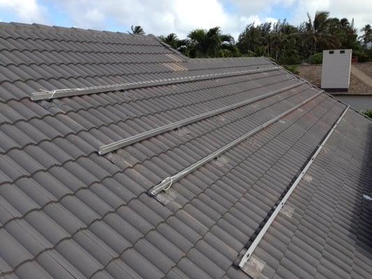 tile roof with flashings and racking