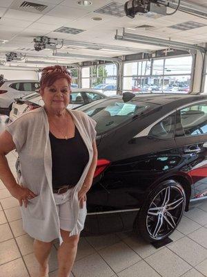 My wife in front of our new Accord Touring !