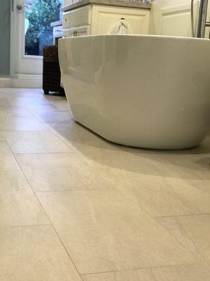 Emil , Italian porcelain tile with rectified edges , free standing bathtub installed in Danville Ca