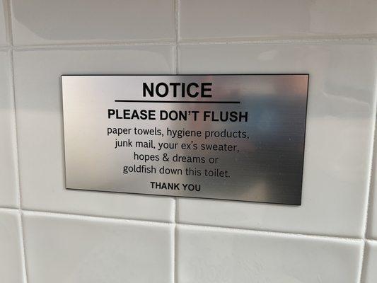 Funny sign in bathroom