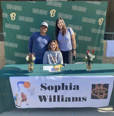 Dr. Lopez/coach & Elgin Mack on Sophia's signing day. 2021