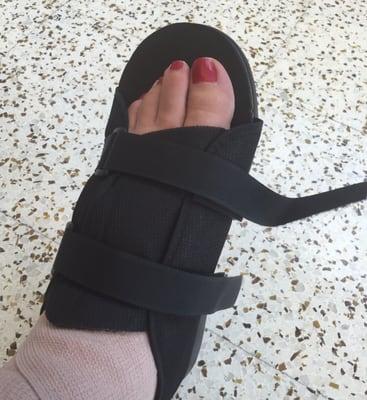 Foot diagnosed with Tendinitis, and fitted with ace bandage and boot.