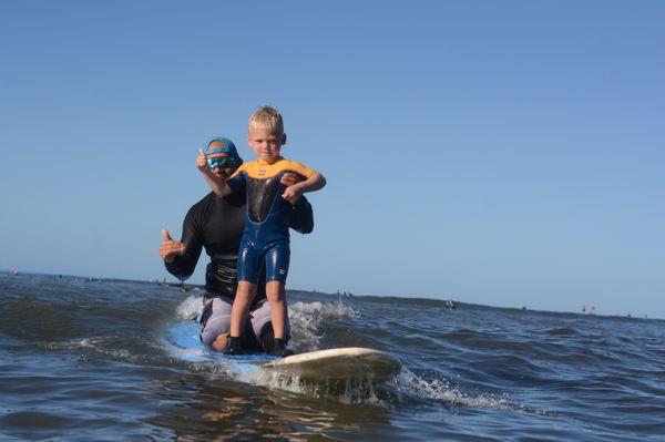 My 4 year old was so cautious and nervous to try surfing, but Carlos bonded with him and they rode the waves!