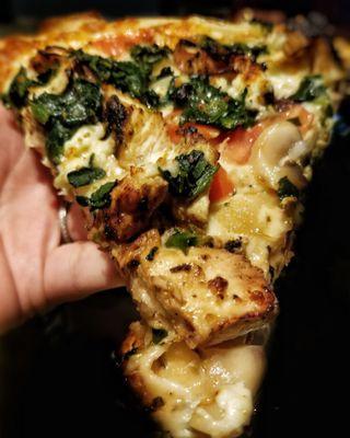 Greek pizza with chicken.