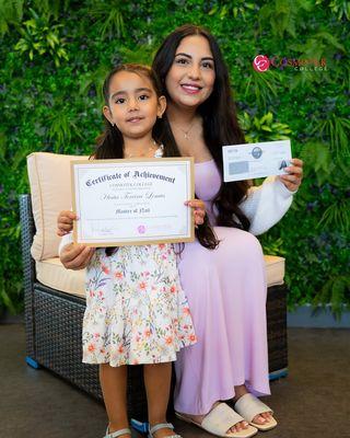 A proud moment for Xiata and her adorable little supporter as she celebrates the successful completion of the Master of Nail program. #nail