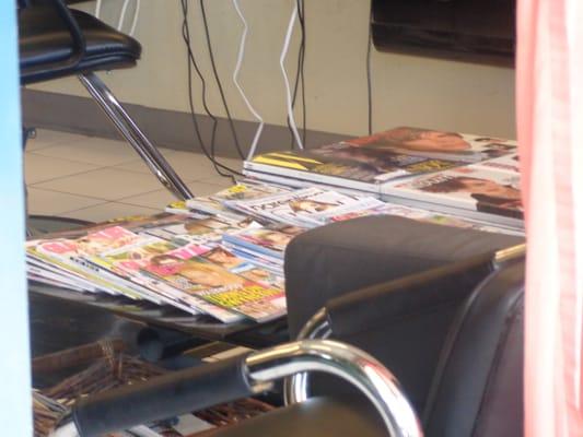 The waiting area consists of 2 chairs and a sofa (one of the chairs is a bit wobbly). ... There are tons of magazines to read.