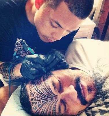 Personal tattoo artist for the king of Polynesia. Over 24 hours to date on his face ( Moko )