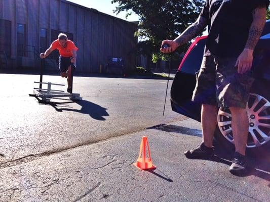 Karl performing sprints with the Prowler sled!