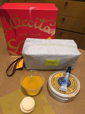 L'occitane grand reopening treats: mimosas & macaroons - sweet! Bought some needed gifts too...