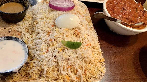 Butter Chicken Biriyani and a spicy lamb tikka masala .