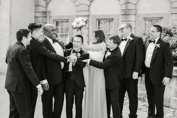 I outfitted my groomsmen in tuxes from The Black Tux. My wedding tux was custom-made by Trio Custom Clothiers. Leigh Wolfe Photography.