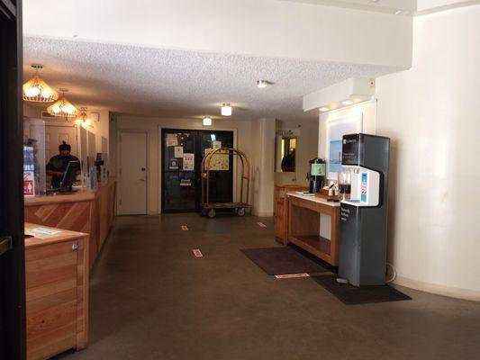 Reception area with the Lava Tube Restaurant/Bar entrance, water and ice tea dispensers.