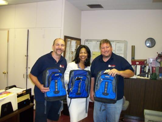 donated back packs for the North Babylon schools