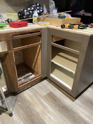 The original cabinets on the left and the refinished on the right