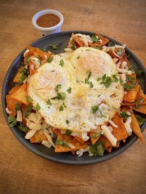 Chilaquiles with over medium eggs