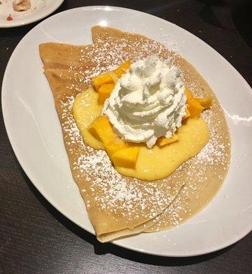 Seasonal ~ Limited time. Fresh mangoes, mango sauce and whipped cream.