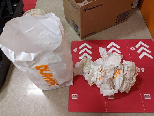 Bag full of dirty wadded up napkins to make the bag look full to hide the fact that half the order was missing.