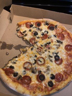 pepperoni mushrooms black olives (pizza was uncut as requested)