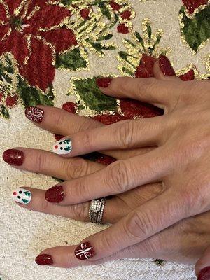 These technicians especially, Mary, are excellent!  My beautiful holiday nails.  Thanks ladies you all Rock!