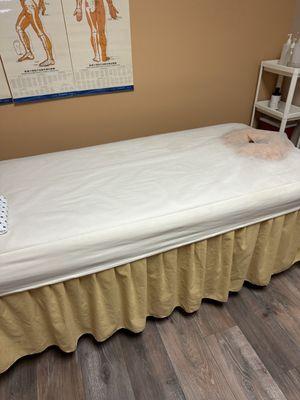 Clean treatment room/ massage bed