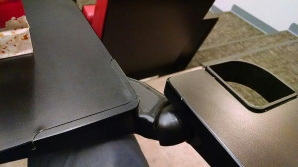 A folding table under reach armrest that even lefties can use!