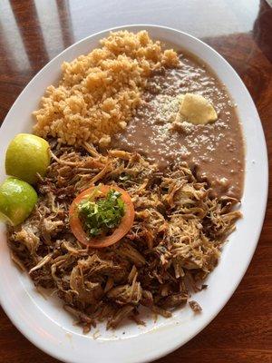 Carnitas plate with rice and frijoles puerrcos