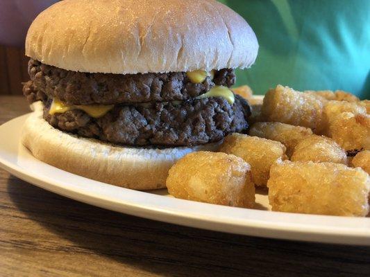 Huge double cheeseburger and tots