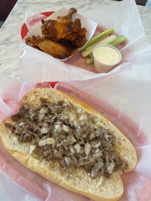 Cheesesteak and extra hot wings