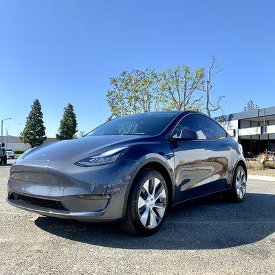 Tesla Model Y after ceramic window tint and coating.