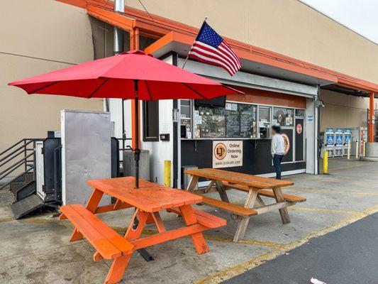 A couple of tables outside LJ's