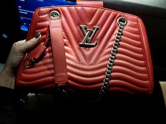 Beautifully restored LV bag after a hurricane flood