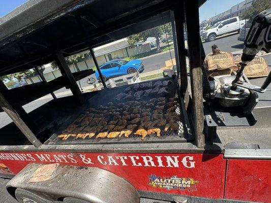 They grilling right in from of the store.