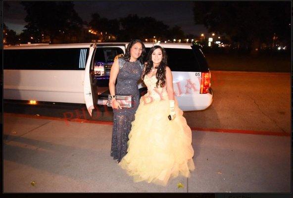 One of our limousine customers arriving to her Sweet 16 in style with our White 14 Passenger GMC Limousine.