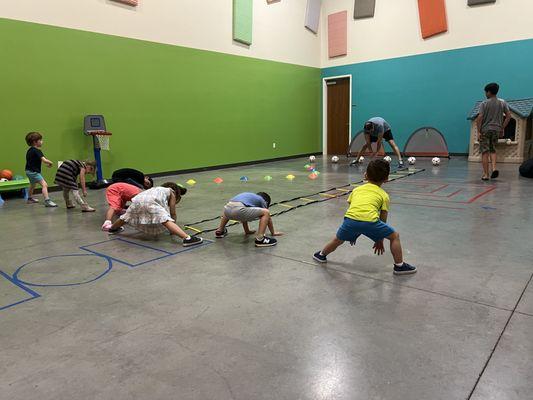 Stretching and warming up to play soccer.