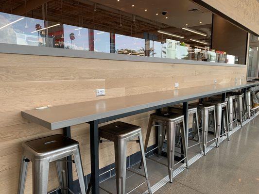 Seating, behind the Starbucks counter, facing the parking lot