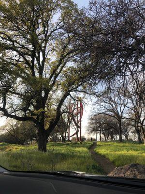 Sculpture ft trees from parking lot area