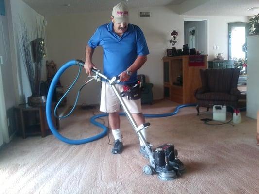 Owner cleaning with the roto vac