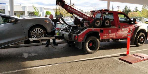 Jim unloading the car in the dealership