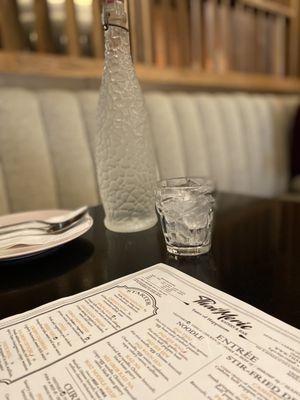 Chilled bottle of water at your table.